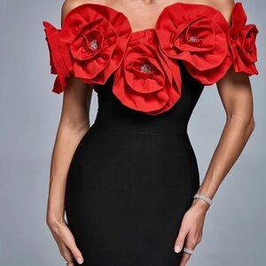 One-Shoulder Black Dress with Red Floral Rosette Detail